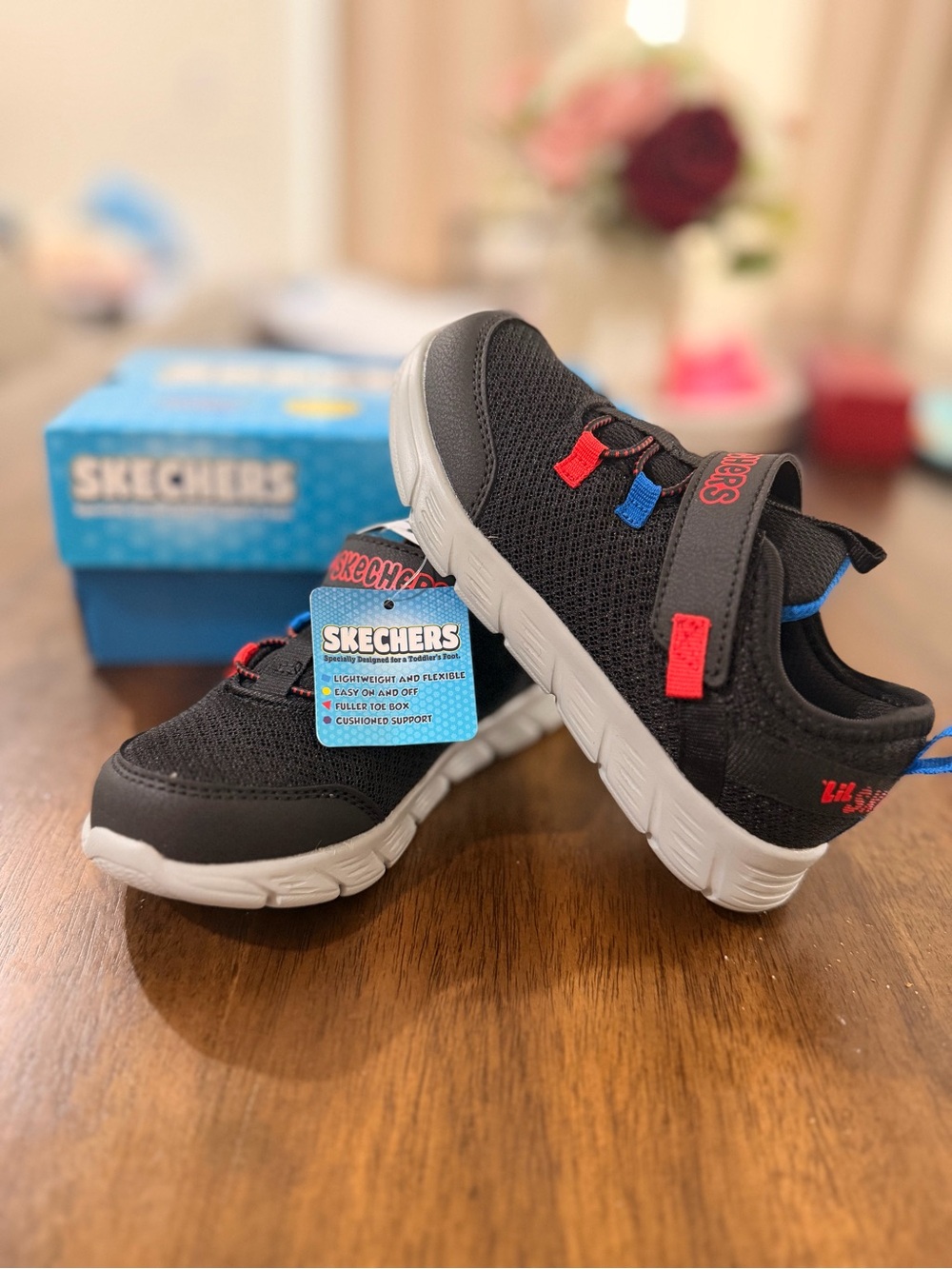 Skechers Kids Black Sneakers with Red & Blue Accents